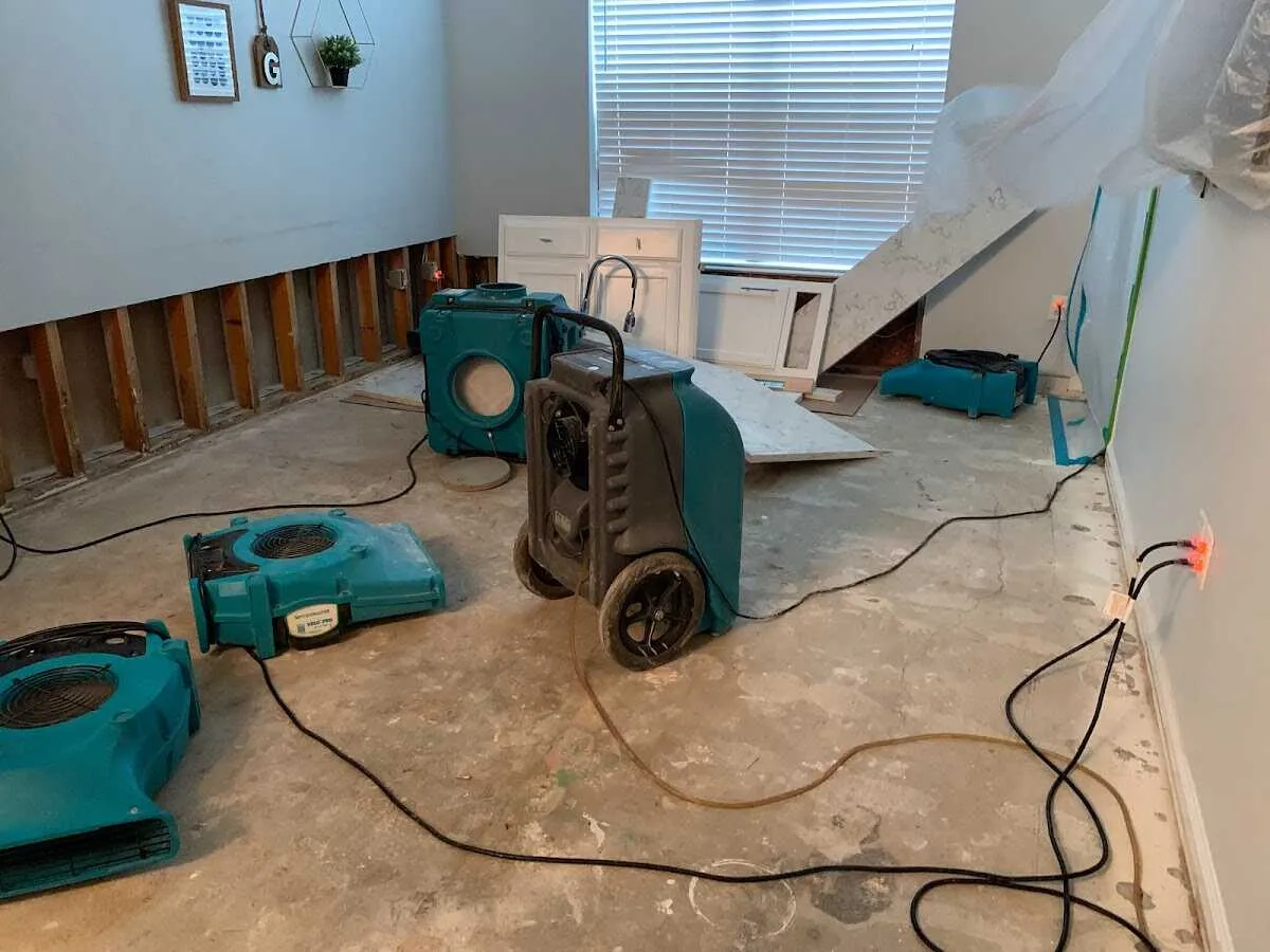 Dehumidifier in flood-cut room for Water Damage Restoration in Fallsburg